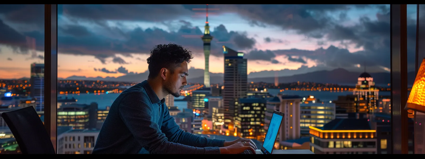 a business owner studying audience profiles and competitor demographics on a laptop, surrounded by colourful charts and graphs.