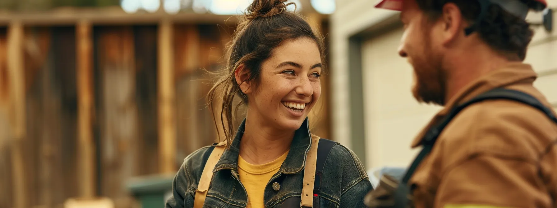 a tradesperson talking to a satisfied customer, with a warm smile and open body language, showcasing effective communication and building trust.